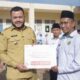 Walikota Padang Serahkan Bantuan PT Semen Padang Untuk MTsS Luki