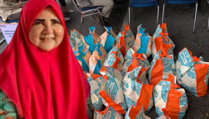 Hj. Nevi Zuairina Salurkan Bantuan BNI untuk Korban Kebakaran Pasar